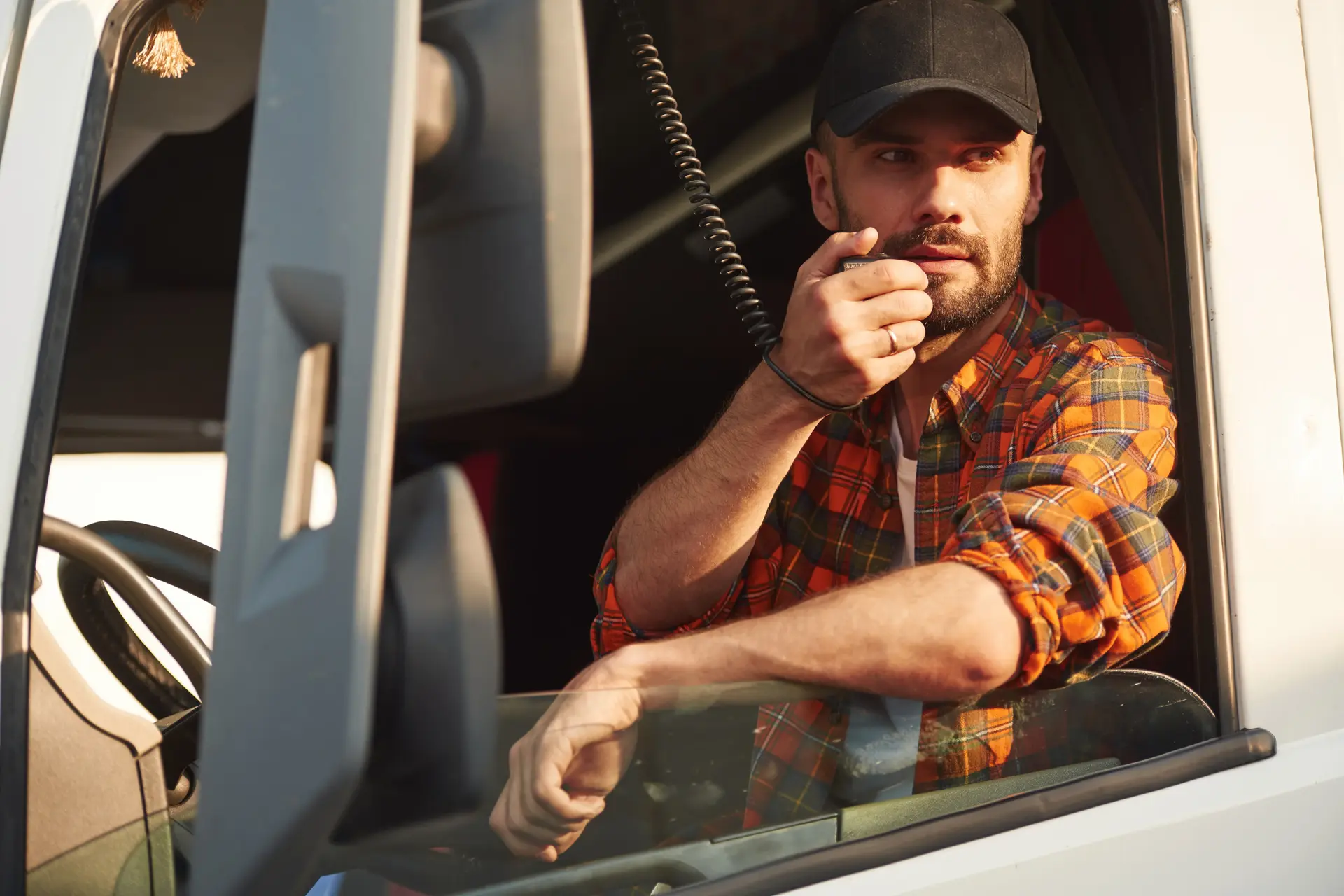 Truck driver using radio